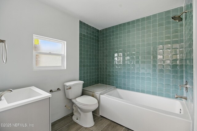 6878 Lenox Ave, Jacksonville, FL 32205 - full bath featuring wood finished floors, tub / shower combination, and toilet