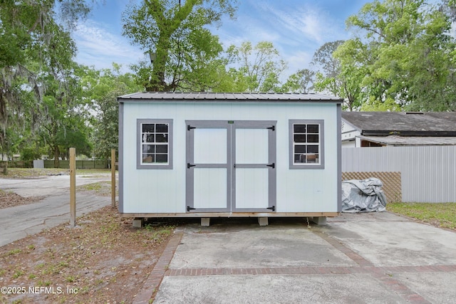 6878 Lenox Ave, Jacksonville, FL 32205 - view of shed with fence