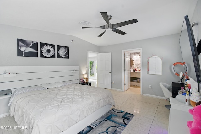 6878 Lenox Ave, Jacksonville, FL 32205 - bedroom featuring connected bathroom, a ceiling fan, baseboards, and lofted ceiling