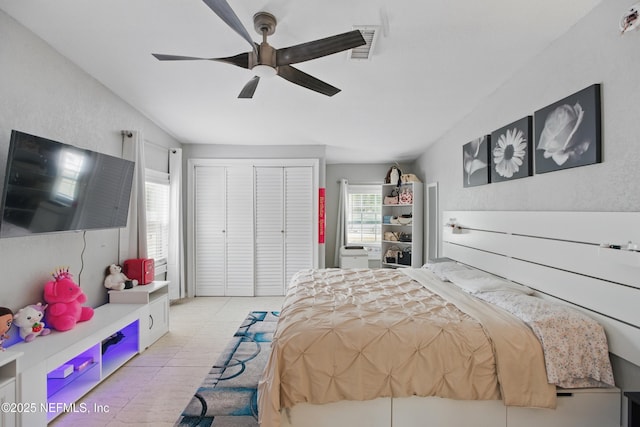 6878 Lenox Ave, Jacksonville, FL 32205 - bedroom with a ceiling fan, visible vents, light floors, and a closet