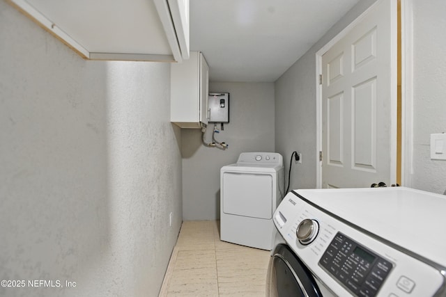 6878 Lenox Ave, Jacksonville, FL 32205 - laundry area with washer and dryer, laundry area, a textured wall, and water heater