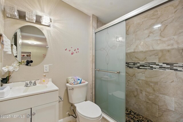 6878 Lenox Ave, Jacksonville, FL 32205 - full bath featuring vanity, a stall shower, and toilet