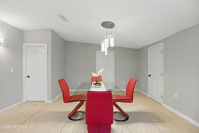6878 Lenox Ave, Jacksonville, FL 32205 - dining space featuring baseboards and visible vents