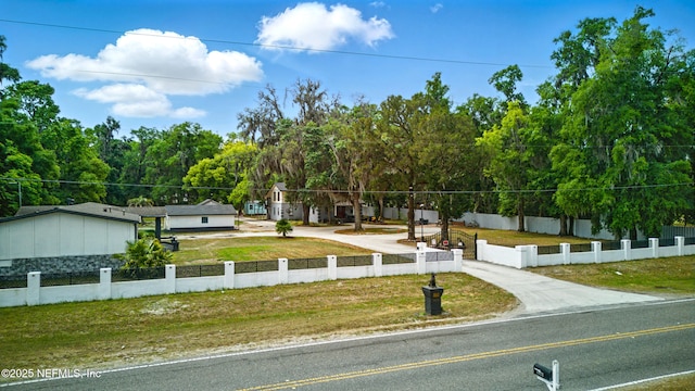 6878 Lenox Ave, Jacksonville, FL 32205 - view of front of house featuring a front lawn and a fenced front yard