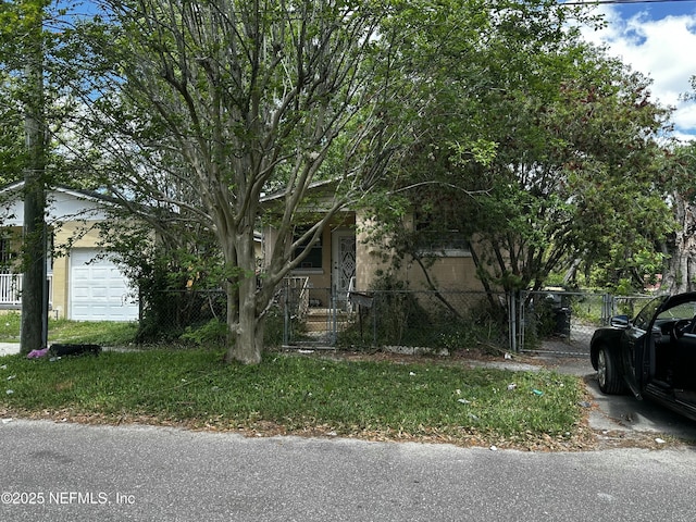 view of front of home with a gate and a fenced front yard