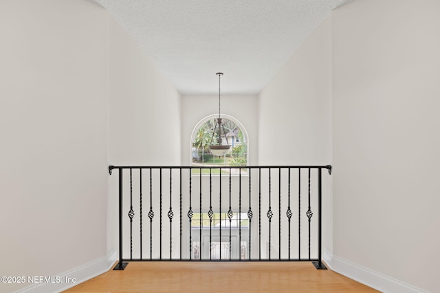 2762 Seagate Ave, Jacksonville Beach, FL 32250 - corridor featuring baseboards and light wood finished floors