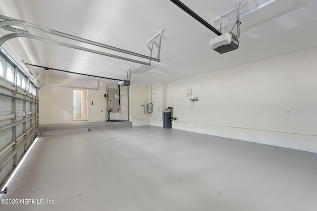 2762 Seagate Ave, Jacksonville Beach, FL 32250 - garage featuring a garage door opener and heating unit