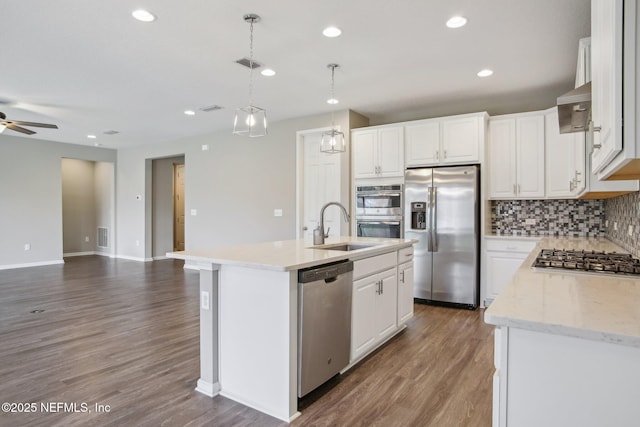 300 Downs Corner Rd, Saint Augustine, FL 32092 - kitchen featuring a ceiling fan, visible vents, a sink, open floor plan, and stainless steel appliances