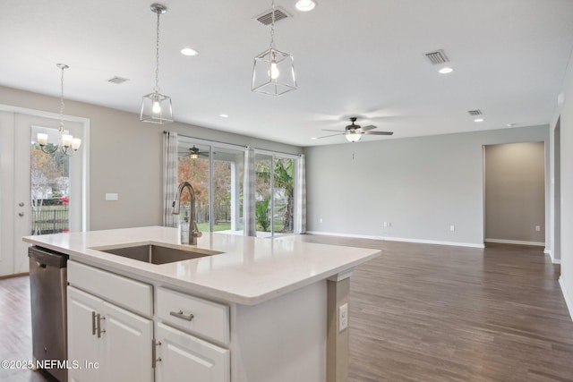 300 Downs Corner Rd, Saint Augustine, FL 32092 - kitchen with stainless steel dishwasher, a ceiling fan, visible vents, a center island with sink, and a sink