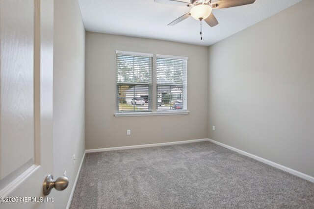 300 Downs Corner Rd, Saint Augustine, FL 32092 - carpeted empty room featuring baseboards and ceiling fan