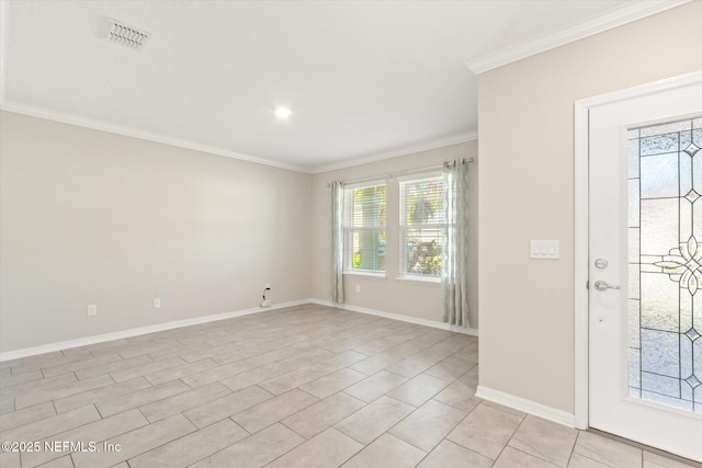 foyer entrance with baseboards, ornamental molding, and visible vents