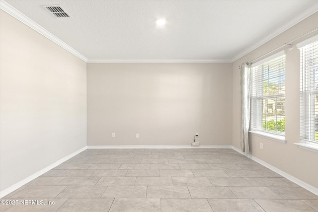 empty room featuring crown molding, baseboards, light tile patterned floors, and visible vents