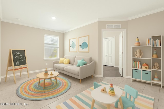 tiled living room featuring baseboards, ornamental molding, and visible vents