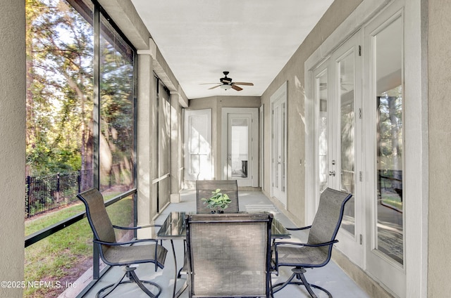 sunroom with a textured wall