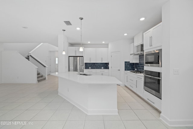 kitchen featuring a sink, visible vents, recessed lighting, backsplash, and appliances with stainless steel finishes