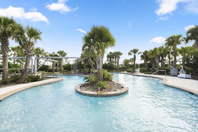 pool with a patio area