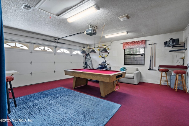 playroom with visible vents, attic access, billiards, a textured ceiling, and carpet flooring