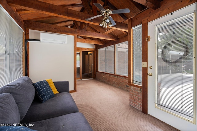 living area featuring carpet flooring, a wall mounted air conditioner, a ceiling fan, wooden ceiling, and vaulted ceiling with beams