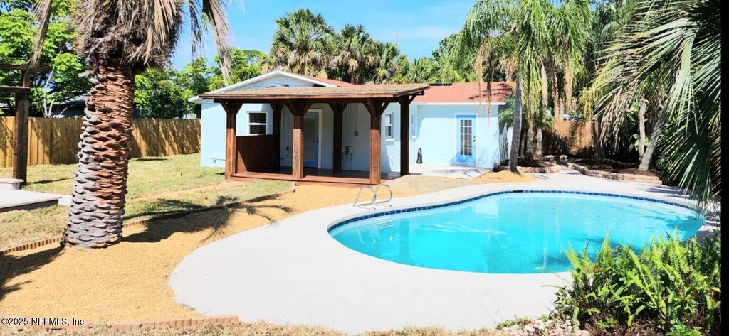 20 Norberta Way, Jacksonville Beach, FL 32250 - view of swimming pool with a fenced in pool, a patio, and a fenced backyard
