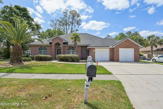 view of front of home with roof with shingles, an attached garage, a front lawn, brick siding, and driveway