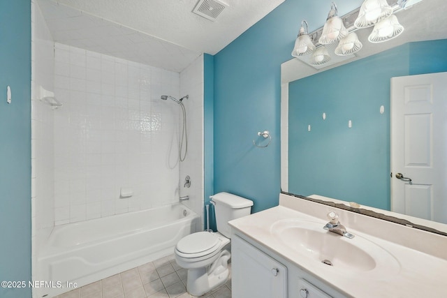 bathroom featuring visible vents, shower / tub combination, tile patterned floors, vanity, and toilet