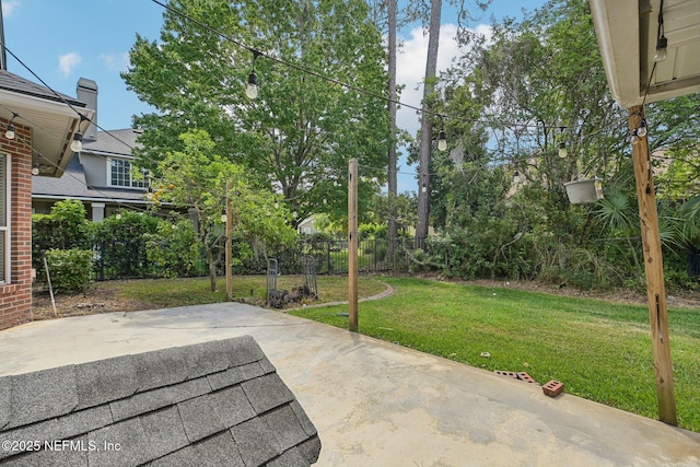 view of patio with fence