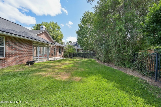 view of yard with fence