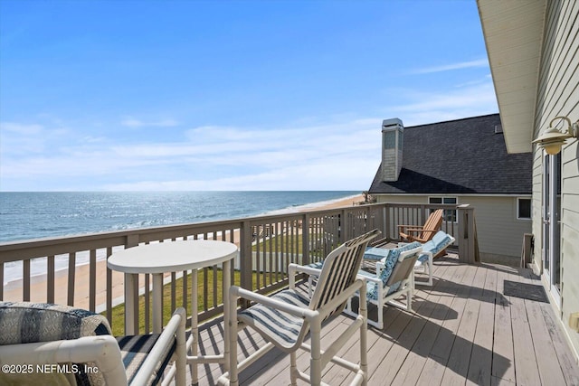 3365 N Ocean Shore Blvd, Flagler Beach, FL 32136 - wooden terrace featuring a beach view and a water view
