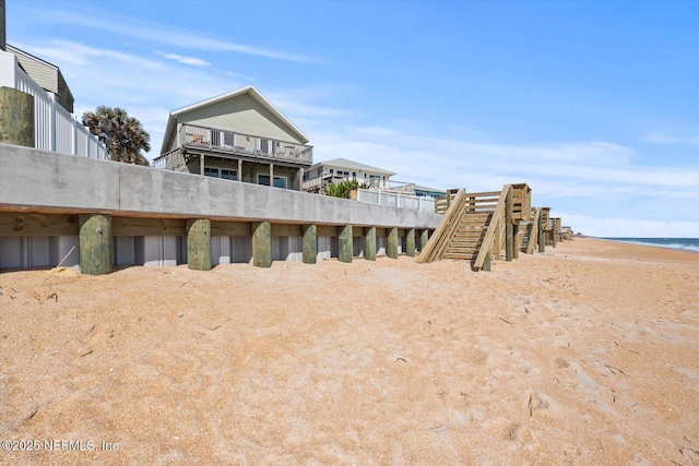 3365 N Ocean Shore Blvd, Flagler Beach, FL 32136 - back of property featuring a beach view and a water view