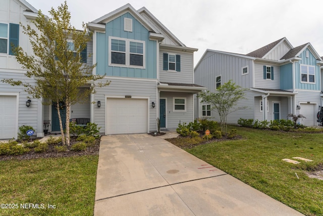 10318 Benson Lake Dr, Jacksonville, FL 32222 - view of front of house featuring board and batten siding, a front lawn, a garage, and driveway