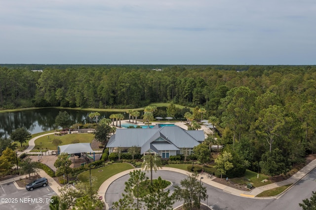 10318 Benson Lake Dr, Jacksonville, FL 32222 - drone / aerial view of a forest, a nearby body of water, and a pool