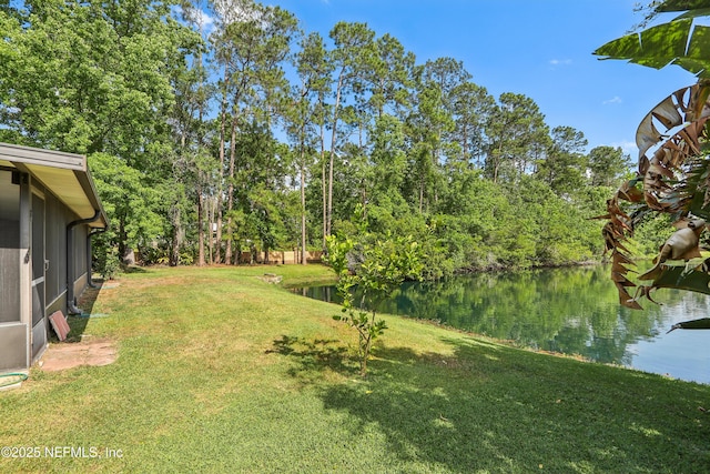 400 Harvest Bend Dr, Fleming Island, FL 32003 - view of green lawn with a water view and view of scattered trees