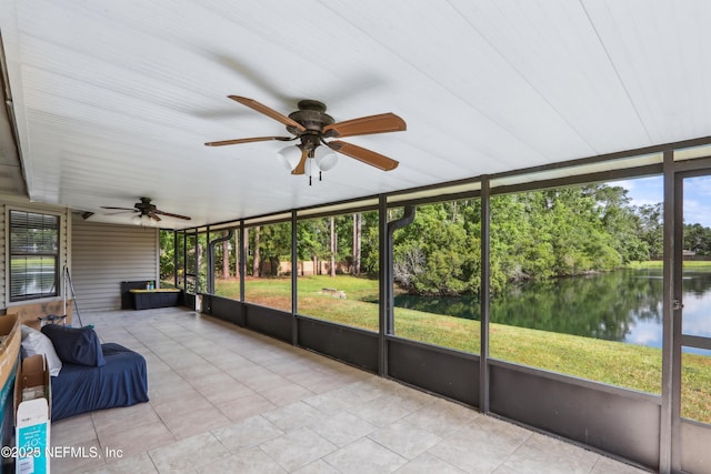 400 Harvest Bend Dr, Fleming Island, FL 32003 - unfurnished sunroom with a ceiling fan, a water view, and view of scattered trees