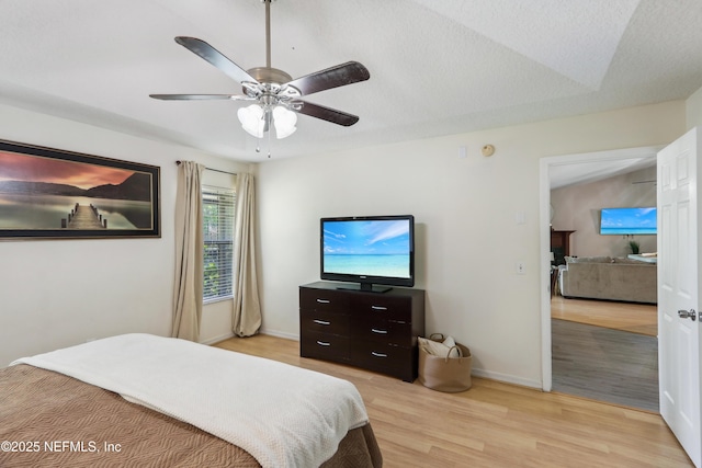 400 Harvest Bend Dr, Fleming Island, FL 32003 - bedroom with light wood finished floors, baseboards, and ceiling fan