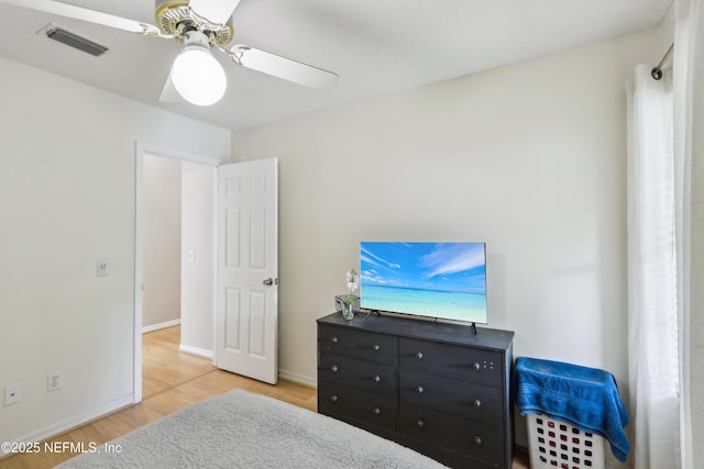 400 Harvest Bend Dr, Fleming Island, FL 32003 - bedroom with light wood finished floors, baseboards, and ceiling fan