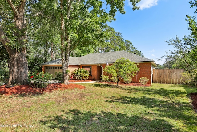 400 Harvest Bend Dr, Fleming Island, FL 32003 - single story home with an attached garage, brick siding, and roof with shingles
