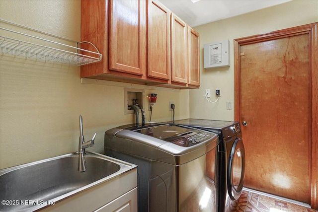 5088 Merrifield Ct, Spring Hill, FL 34608 - laundry room featuring a sink, independent washer and dryer, and cabinet space