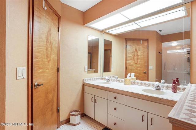 5088 Merrifield Ct, Spring Hill, FL 34608 - full bathroom with double vanity, a sink, tile patterned floors, and a shower stall