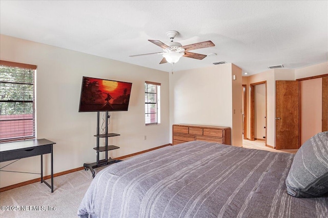 5088 Merrifield Ct, Spring Hill, FL 34608 - bedroom with a ceiling fan, baseboards, visible vents, and light carpet