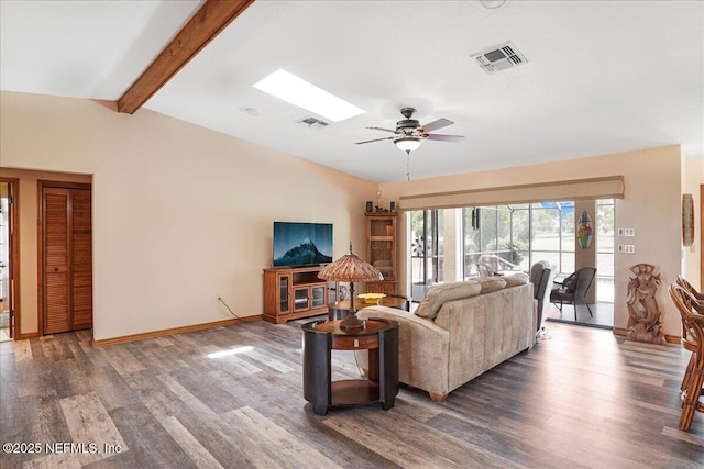 5088 Merrifield Ct, Spring Hill, FL 34608 - living area featuring visible vents, wood finished floors, baseboards, ceiling fan, and vaulted ceiling with beams