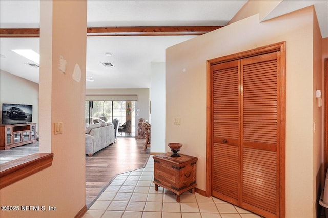 5088 Merrifield Ct, Spring Hill, FL 34608 - hallway with vaulted ceiling with beams and visible vents