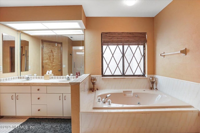 5088 Merrifield Ct, Spring Hill, FL 34608 - full bath featuring double vanity, a tub with jets, a sink, and a shower