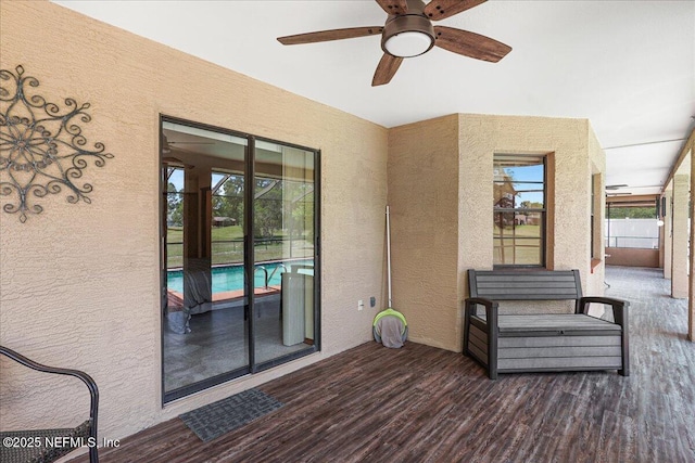 5088 Merrifield Ct, Spring Hill, FL 34608 - deck featuring ceiling fan and an outdoor pool