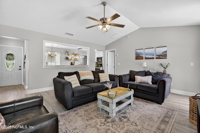 2599 Sandy Hollow Dr, Middleburg, FL 32068 - living area featuring lofted ceiling, wood finished floors, and ceiling fan