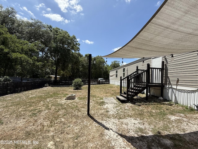 view of yard featuring fence