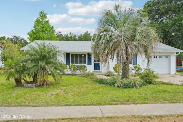 369 Altara Dr, Saint Augustine, FL 32086 - view of front of house with an attached garage, a front yard, concrete driveway, and stucco siding