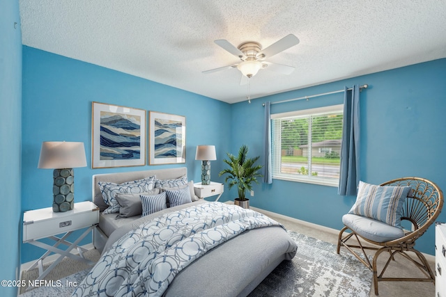 369 Altara Dr, Saint Augustine, FL 32086 - bedroom with carpet, a textured ceiling, baseboards, and a ceiling fan