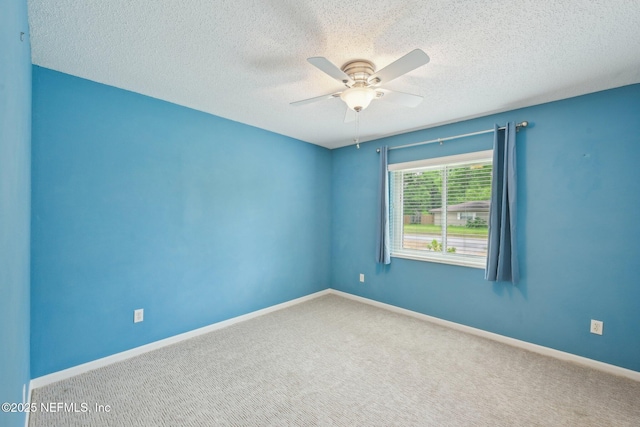 369 Altara Dr, Saint Augustine, FL 32086 - carpeted empty room featuring ceiling fan, a textured ceiling, and baseboards