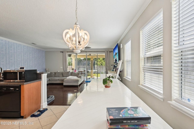3367 Turkey Creek Dr, Green Cove Springs, FL 32043 - kitchen featuring black dishwasher, wallpapered walls, a chandelier, stainless steel microwave, and open floor plan