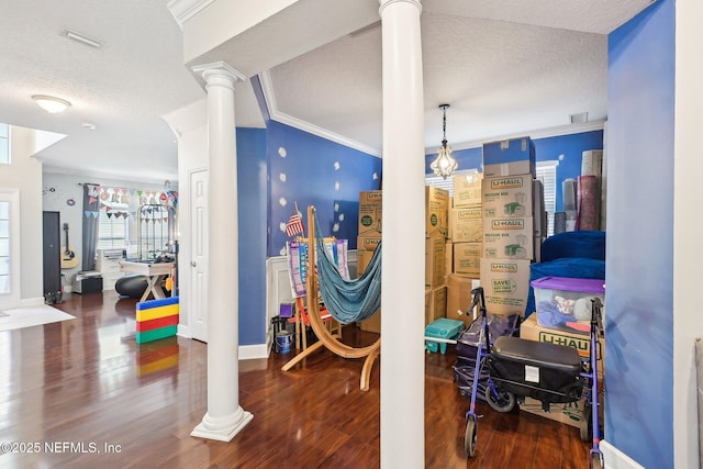 3367 Turkey Creek Dr, Green Cove Springs, FL 32043 - hall with ornate columns, a textured ceiling, wood finished floors, and crown molding